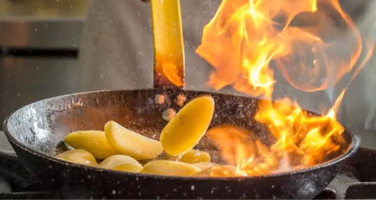 food flambe in pan